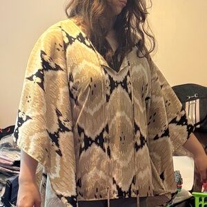 Pullover poncho type top.